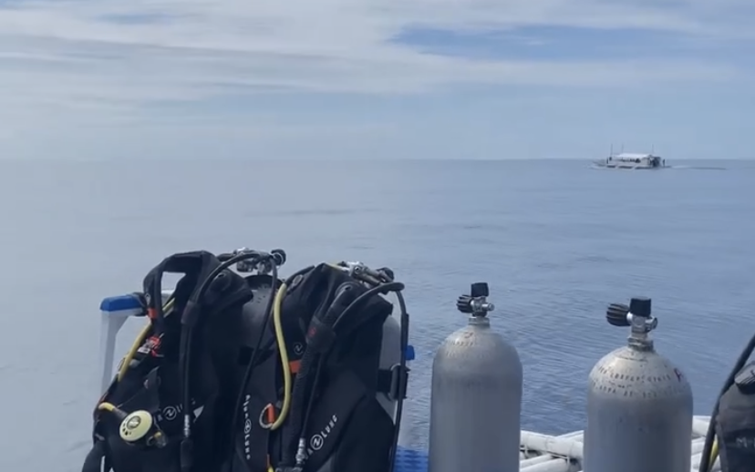 This image has an empty alt attribute; its file name is scuba-diving-1-edited-1.png