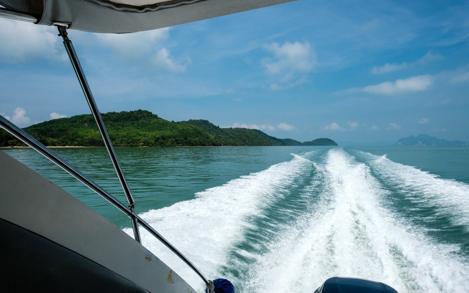 This image has an empty alt attribute; its file name is speedboat-1-edited.jpg