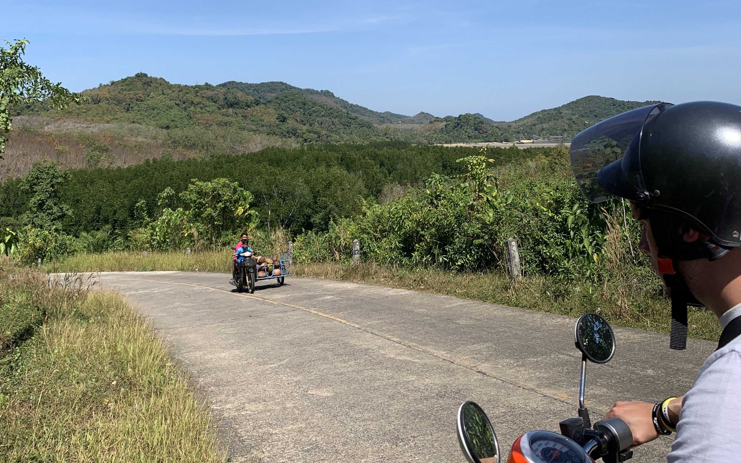 This image has an empty alt attribute; its file name is scooter-riding-kyn-edited.jpg